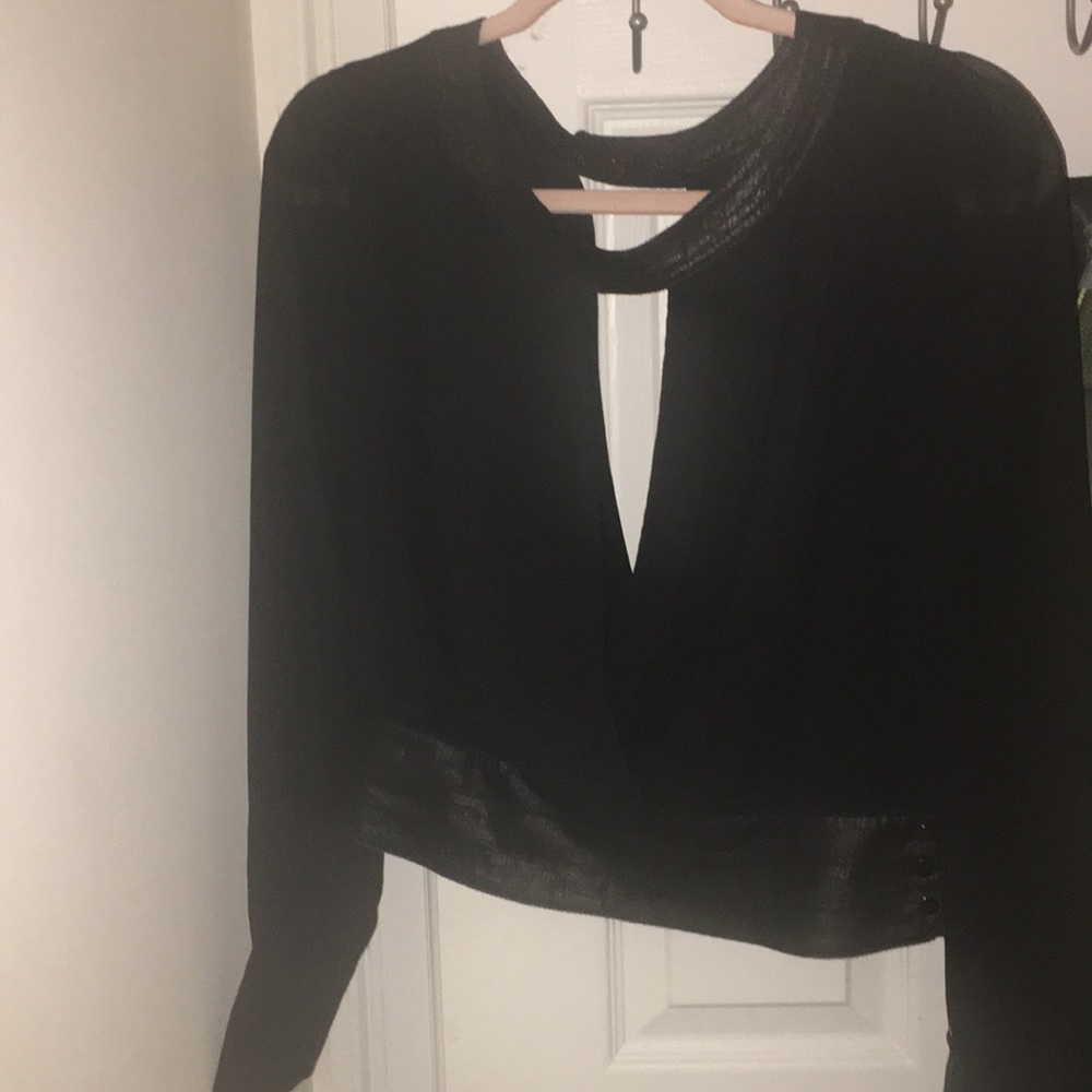 Black going out top